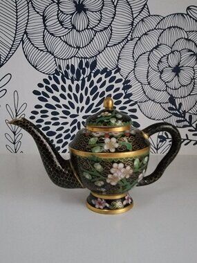 Miniature cloisonne teapot, black with gold, green stems, white flowers GUC
